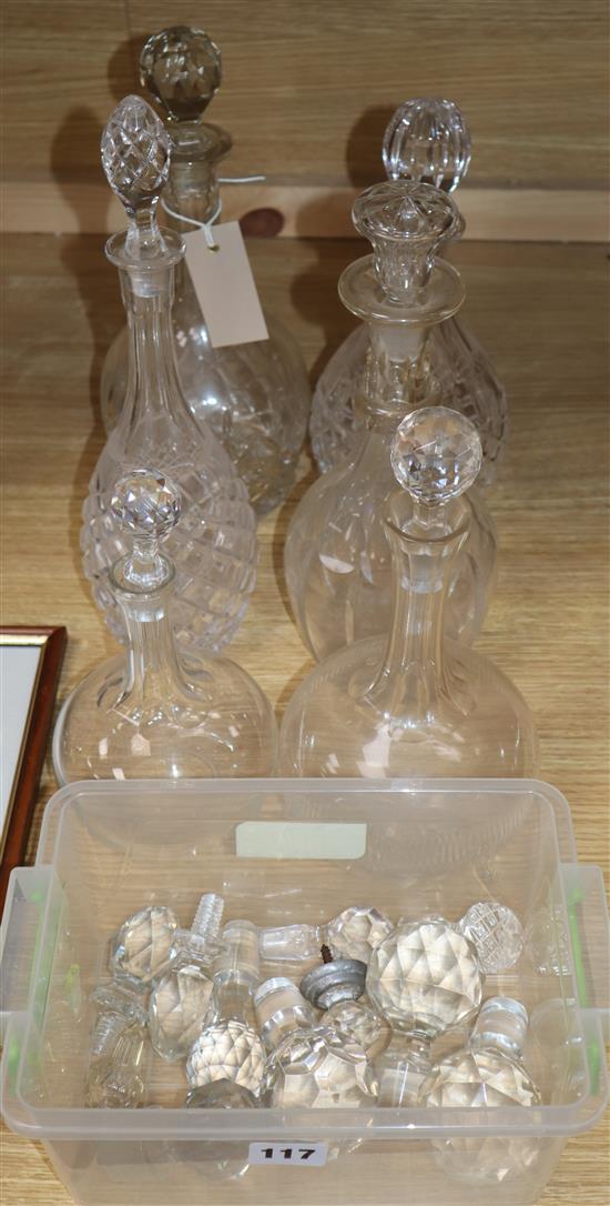 Six cut glass decanters and carafes and stoppers